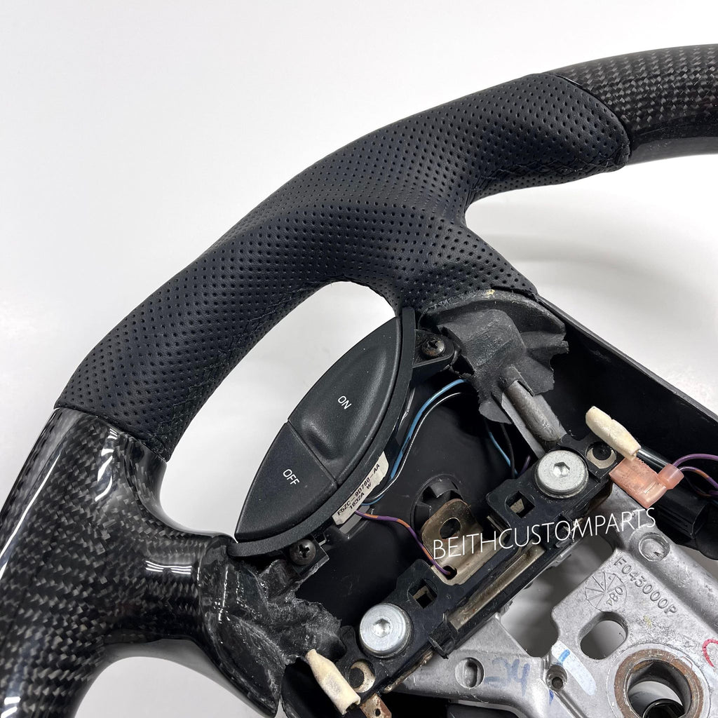 1994-2004 Ford Mustang – Carbon – Black Stitch, Red Stripe