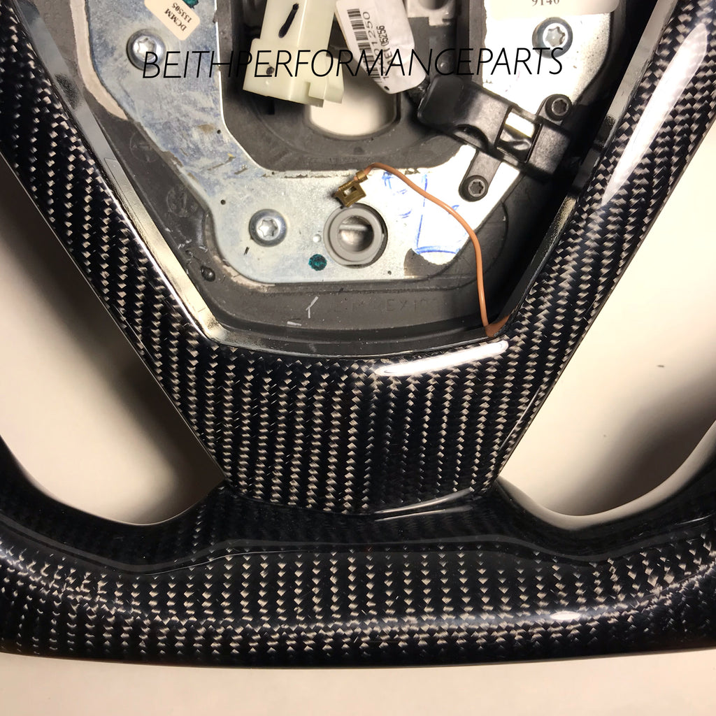 2004-2007 Cadillac CTS-V – Carbon – Black Stitching, Red Stripe