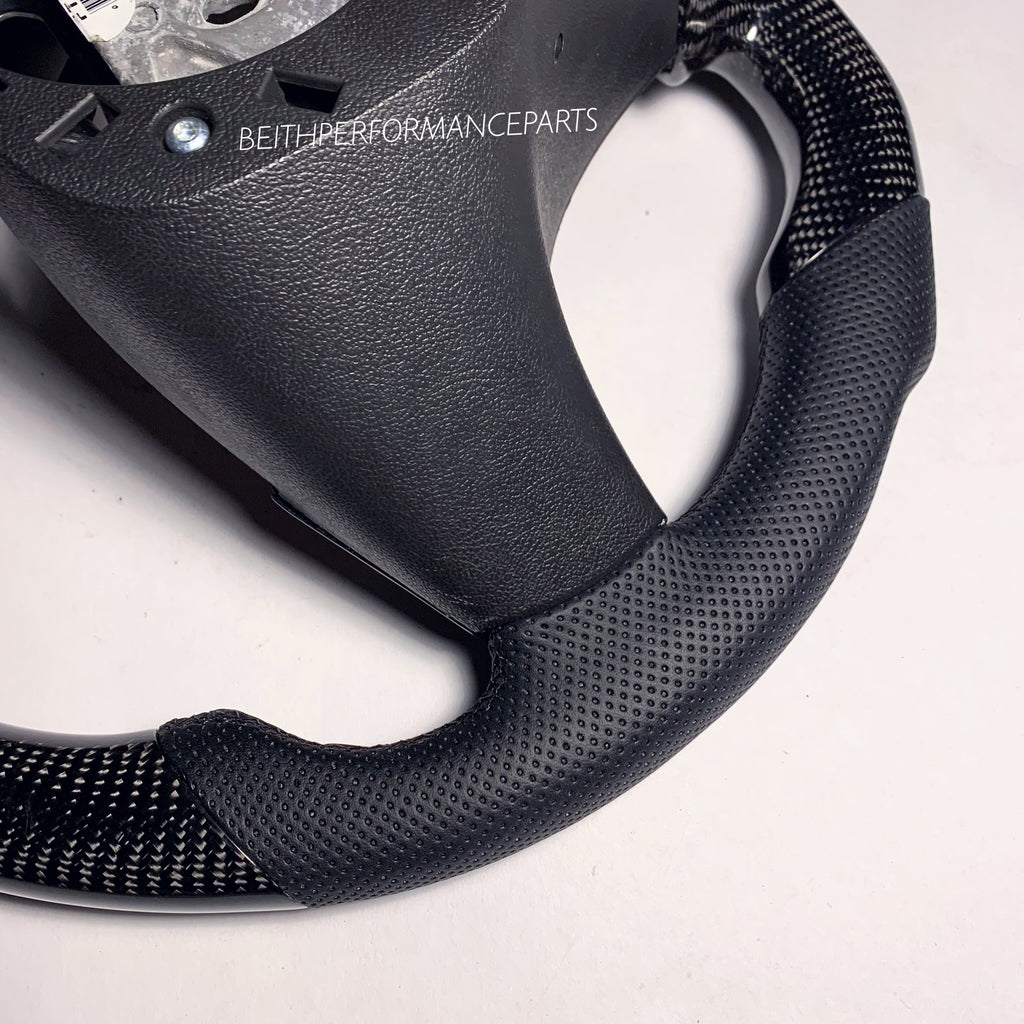 2009-2013 Chevrolet Corvette ZR1 – Carbon – Black Stitching, Blue Stripe