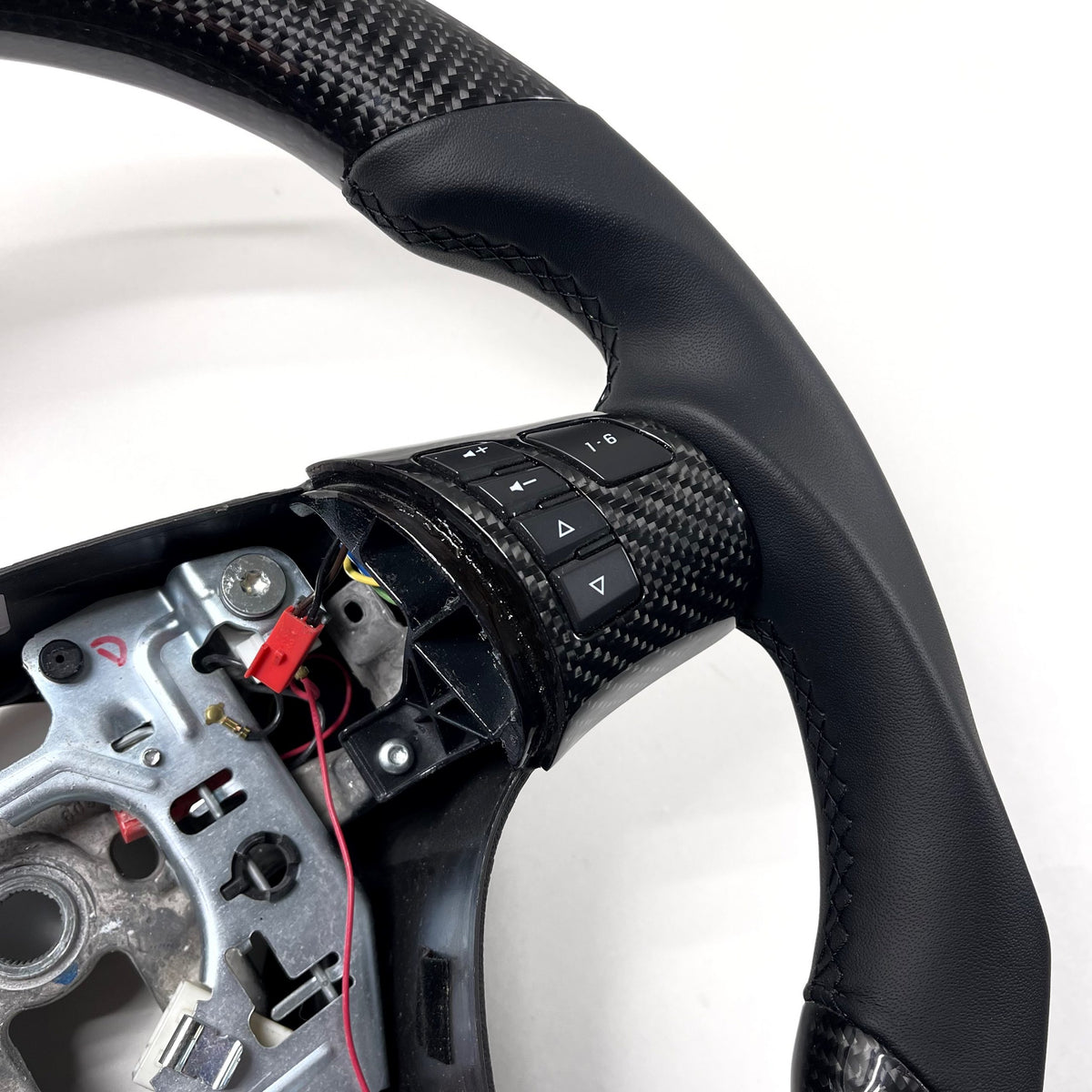 2006-2011 Chevrolet Corvette – Carbon – Black Stitching